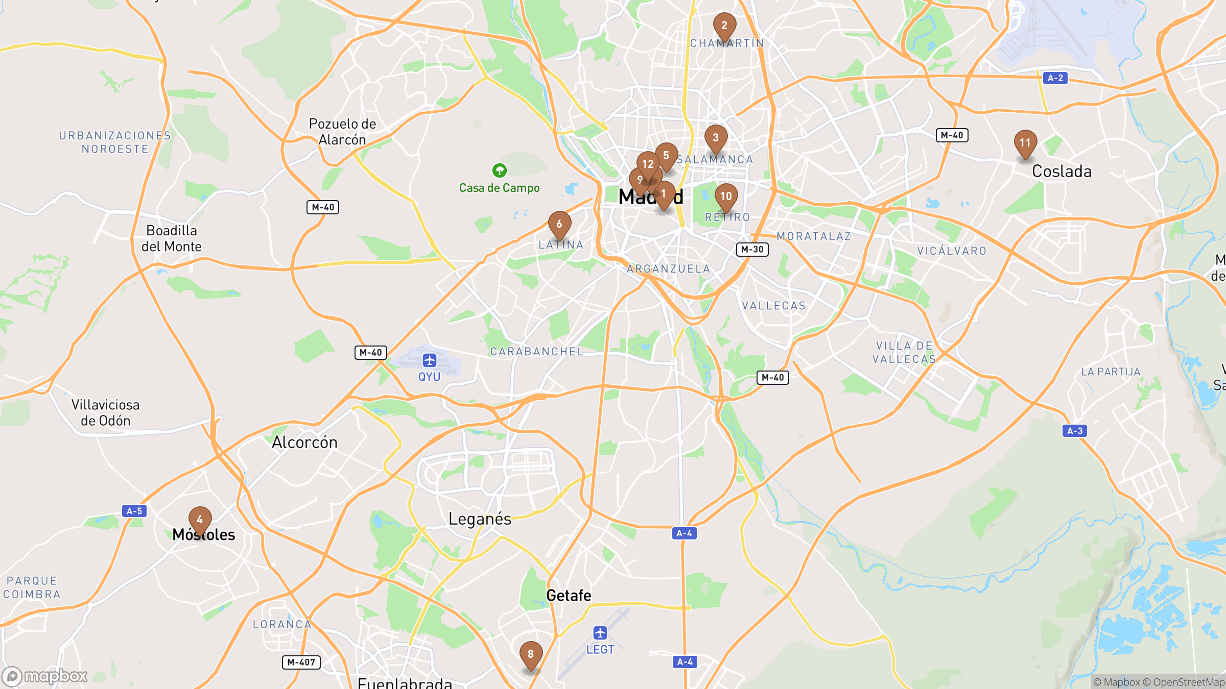 Map of Madrid highlighting Atocha, Chamartín, Salamanca, Malasaña.